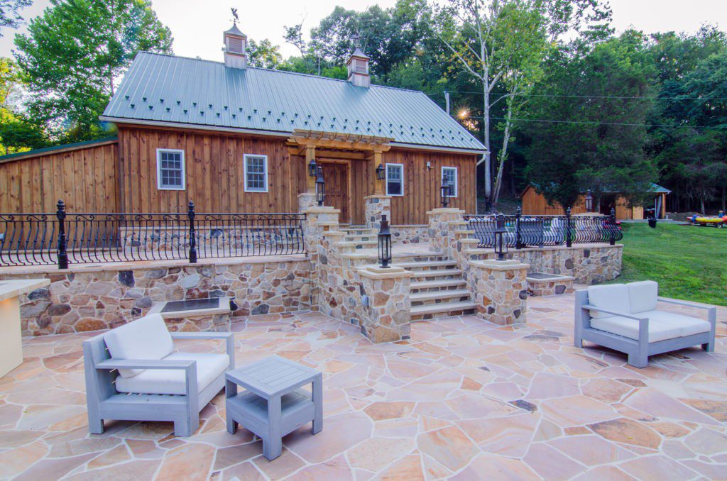 Flagstone patio and outdoor space with furniture