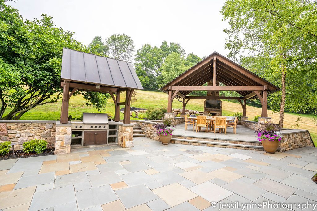 raised stone deck and outdoor grill